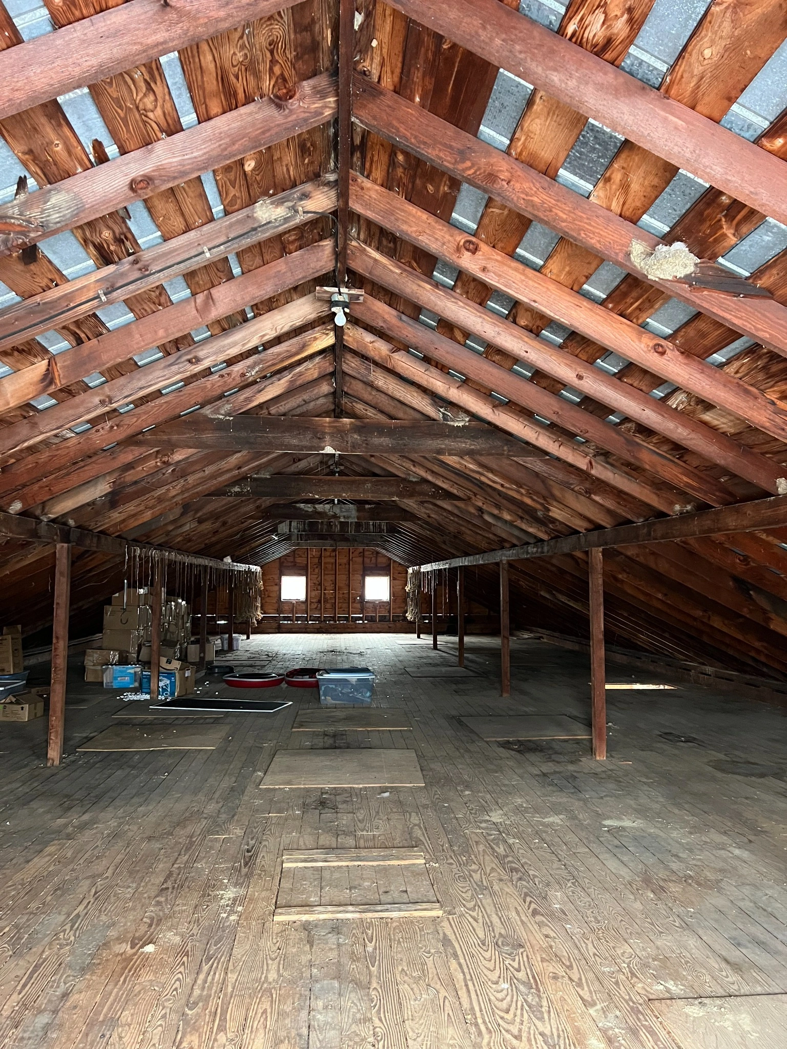 Interior view of barn attic with exposed timber framing